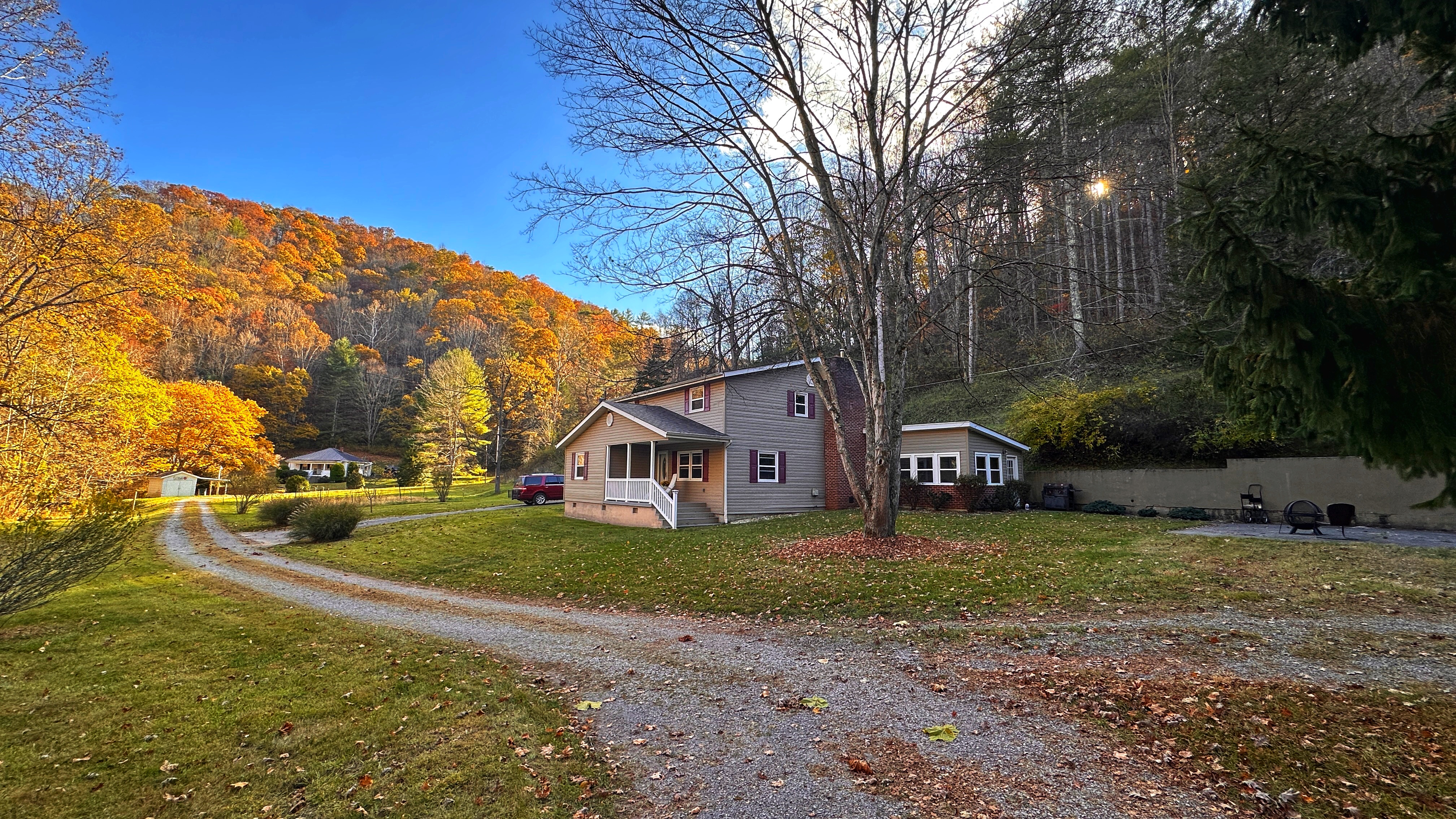 The Creek House cabin exterior with surrounding nature